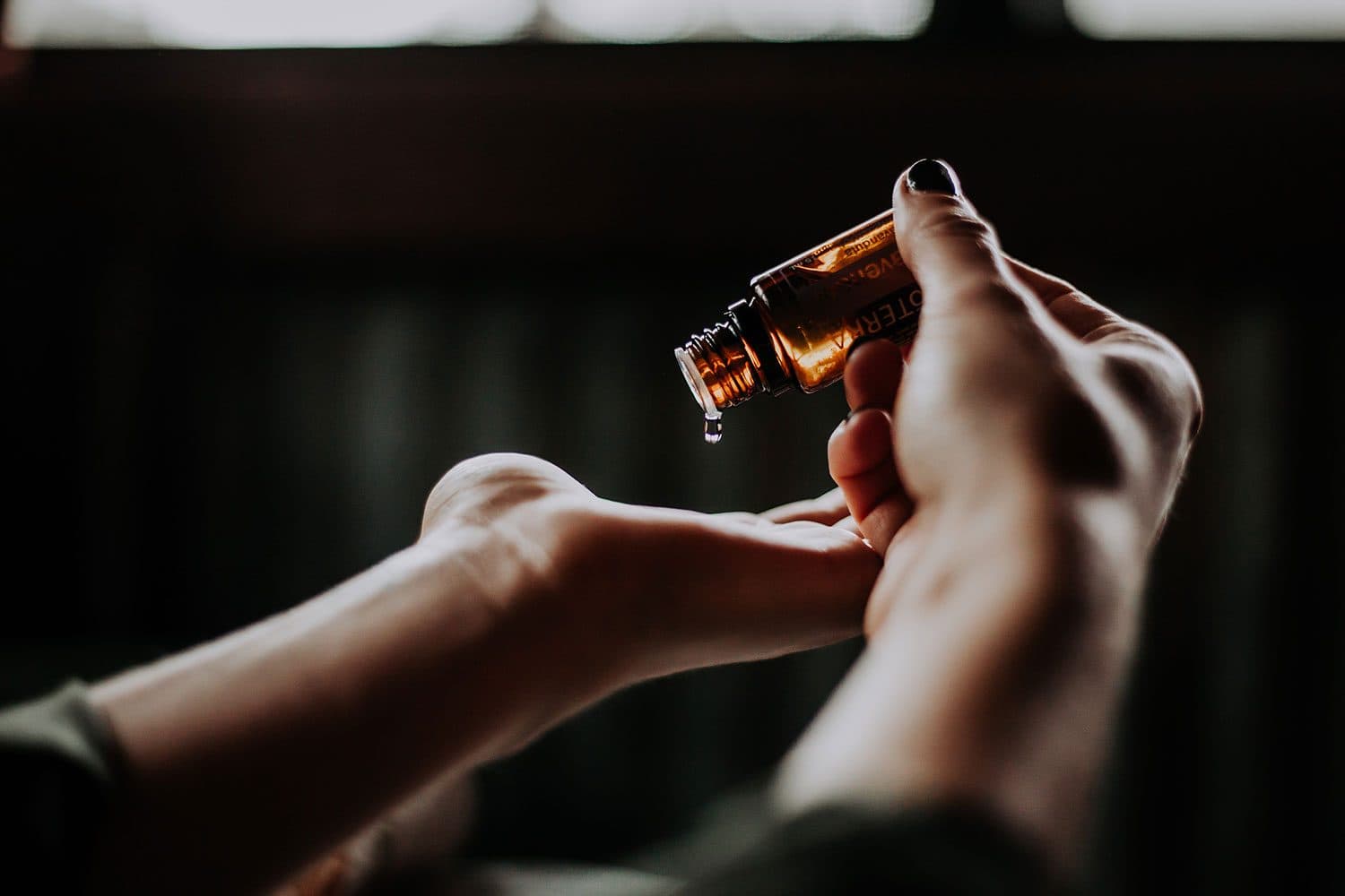 Massage oil poured during a treatment